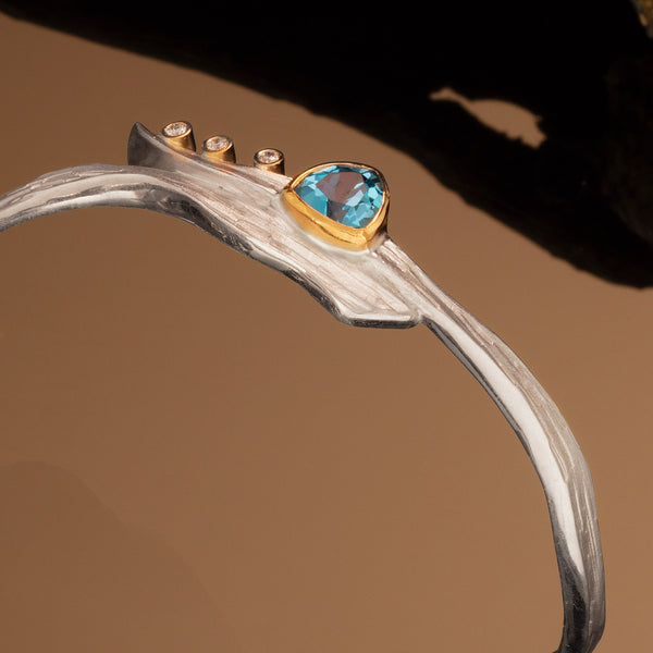 Argentium Swirl Bracelet with Blue Topaz and Diamonds